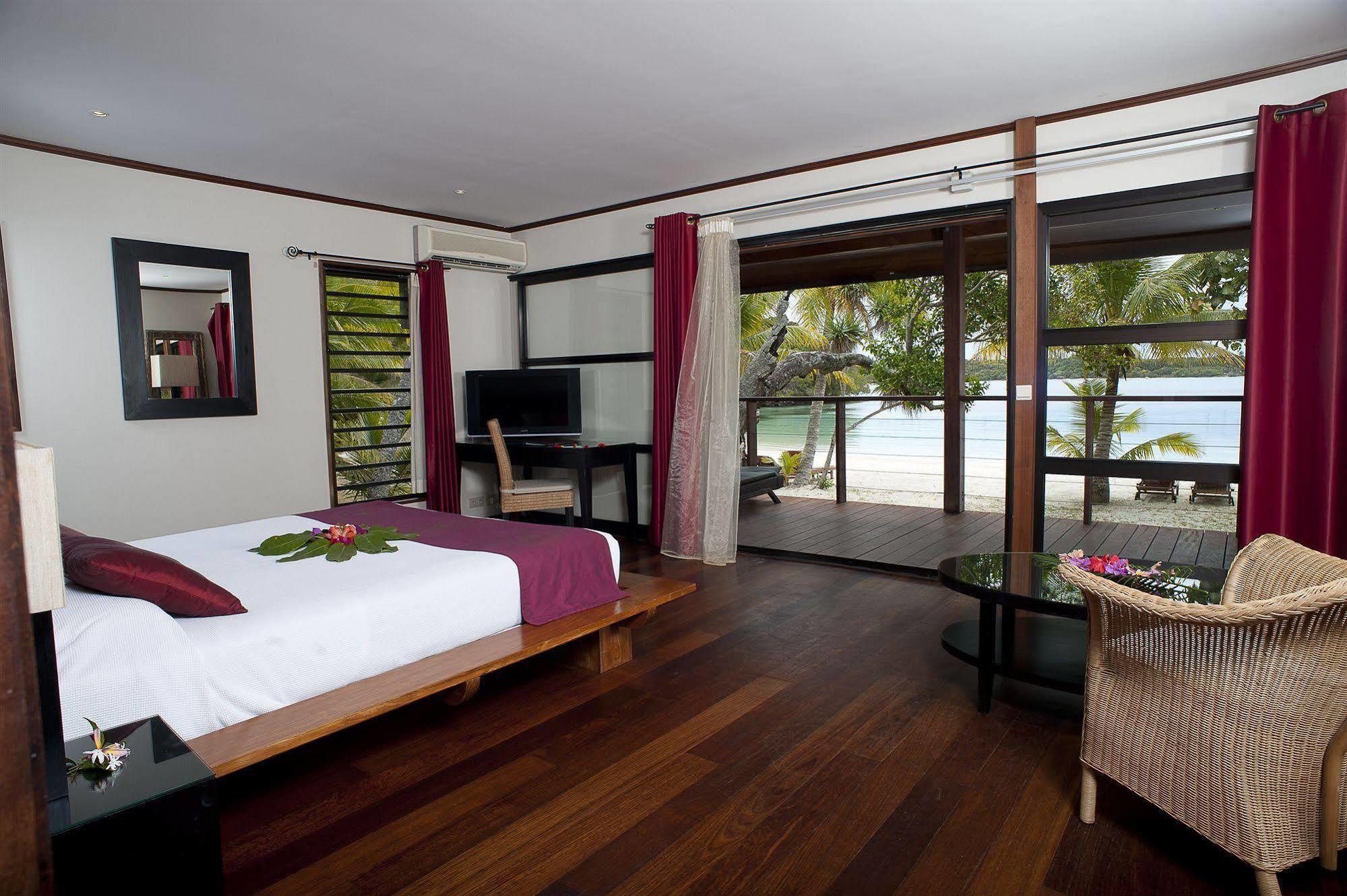 Oure Lodge Beach Resort Kuto Exterior photo